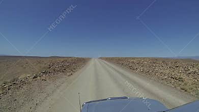 4x4 car driving on a dirt road