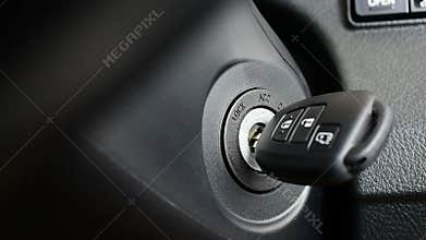 CAR Driver starting the car engine with key by twist method and stop engine