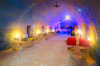 Spectacular ice hotel and bar on the frozen Balea lake