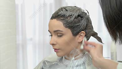 Hair dying in salon.