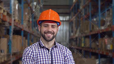 Close up male works in storage.