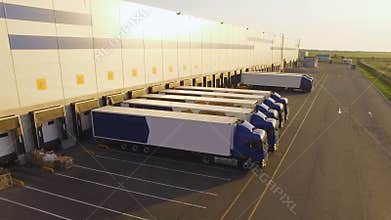 Distribution warehouse with trucks awaiting loading