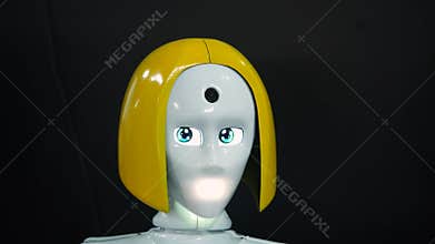 Robot girl with realistic head and face. Camera in the forehead and screens eyes