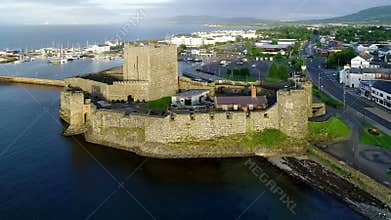 Norman castle and marina in Carrickfergus near Belfast, Northern Ireland, UK