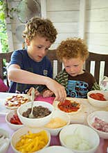Children making Pizza