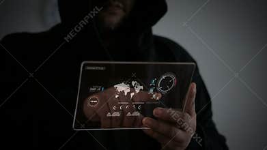 Hacker Using clear glass tablet with code and HUD Head up display interface in dark tone and grain process