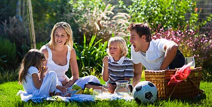 Young family having fun in a picnic