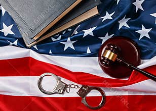Gavel, books and handcuffs