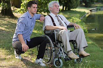 Retired person and male carer