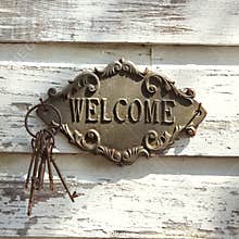 Welcome sign on wall.