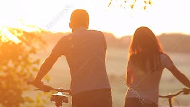 Beautiful couple with bicycles