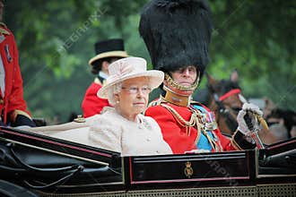 Queen Elizabeth II in an open carriage with Prince Philip for trooping the colour 2015 to mark th