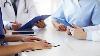Group of doctors at meeting in hospital