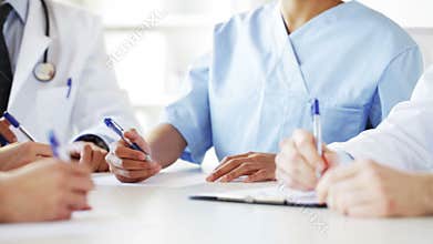 Group of doctors at meeting in hospital