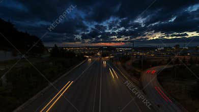 Ultra High Definition UHD 4k Time Lapse Movie of Long Exposure Freeway Traffic Over Cityscape of Seattle Washington at Sunset