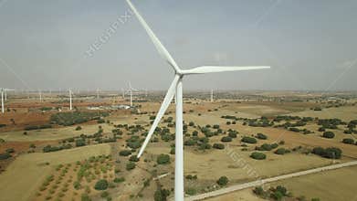 Approaching to wind turbine, aerial view