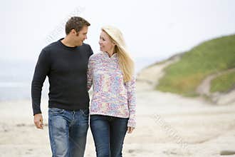 Couple walking at beach