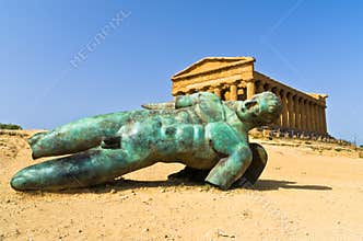 Icarus statue in front of Temple of Concordia at Agrigento Valley of the Temple, Sicily
