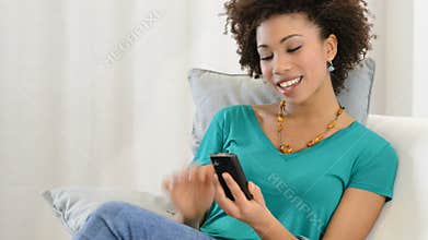 Young woman looking at cellphone