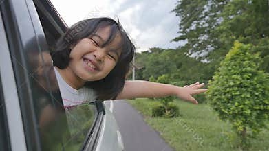 Little Girl Playing on Window Car, Family Traveling on Countryside.