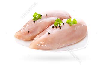 Raw chicken fillets isolated on white background