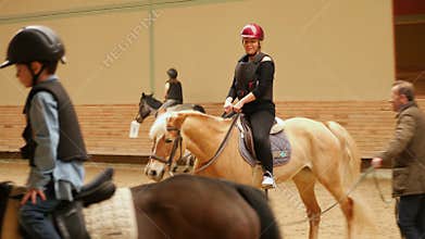 AKYAKA - TURKEY, MAY 2015: woman learning horse riding
