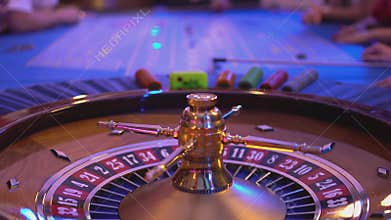 Spinning Roulette wheel and putting bets