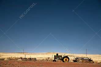 Vintage tractor and old field