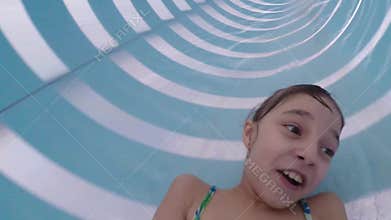 Happy little girl at aqua park