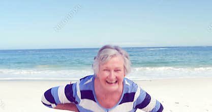 Funny senior woman making faces to the camera