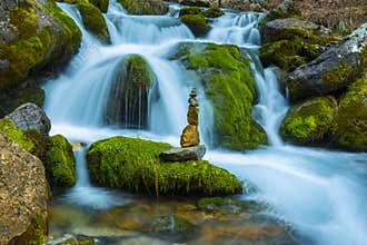 Waterfall waters and zen stones