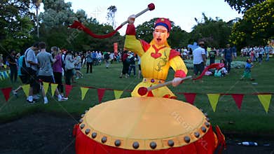 Chinese man play drum lantern in Auckland Lantern Festival