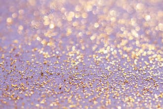 Golden glitter sparkles dust background