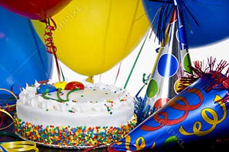 Birthday Cake, party hats and balloons