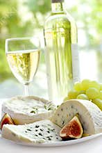Cheese, grape, figs and wine