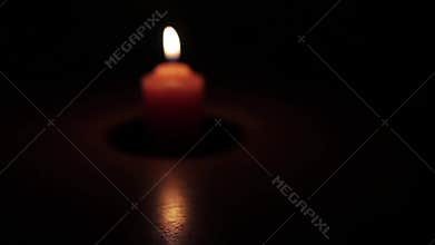 Candle Burning In The Background