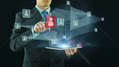 Human resources black management concept business man selecting virtual interface pointing on glass icons hologram from