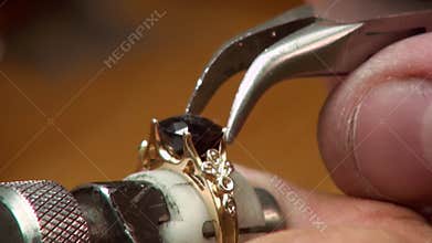 Manual setting of the precious stones in jewelry