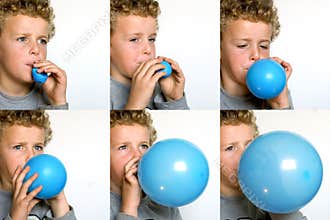 Boy blowing up Balloon