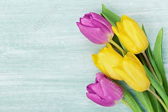 Tulip flowers on rustic table for March 8, International Womens day, Birthday or Mothers day, beautiful spring card