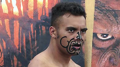 Maori man in traditional greeting