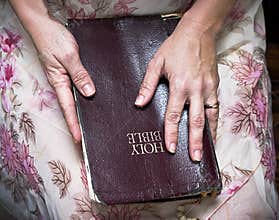 Woman Holding Bible