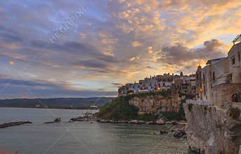 Gargano coast: bay of Vieste.-(Apulia) ITALY-Panoramic view of the old city at sunset.