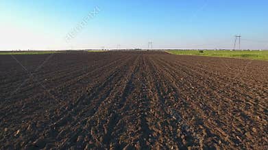 Agricultural plowed field ground soil
