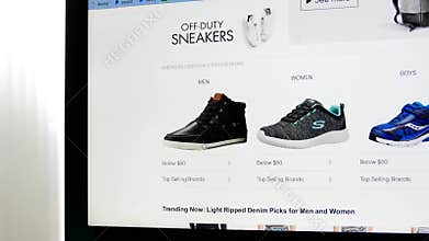 man browsing on amazon back to school list