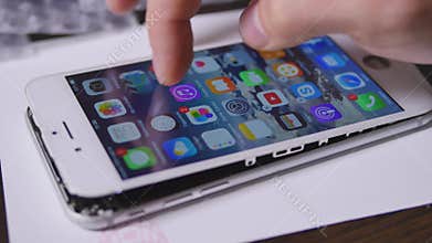 Technician Hand testing Cellphone