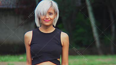 Young Woman Magic Genie Pose While Raining