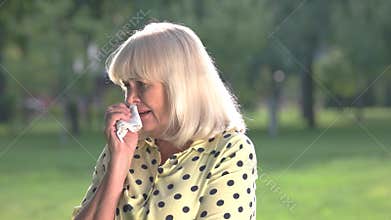 Elderly woman crying.