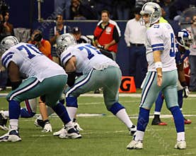 Cowboys Tony Romo Waits for Snap