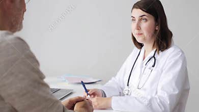 Senior man and doctor meeting at hospital 54